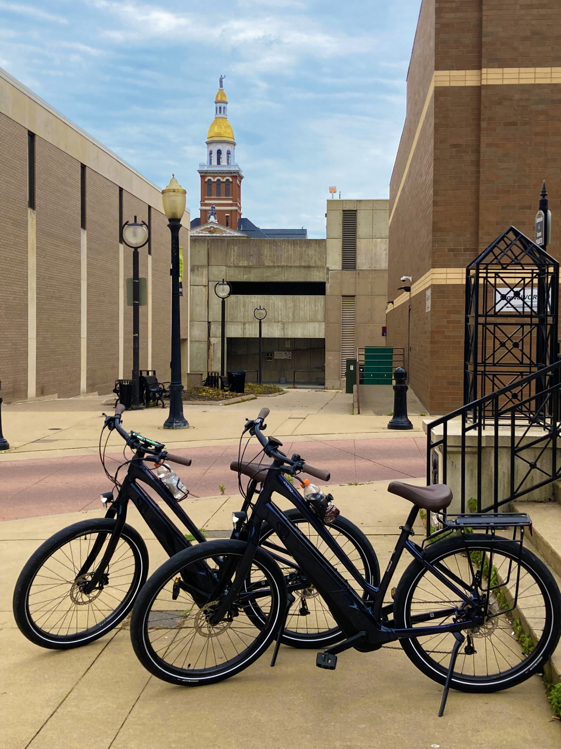 Parked Electric Bikes by the Town Clock in Dubuque, Iowa